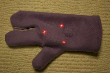 purple fleece 3-fingered mitten with 3 red LEDs