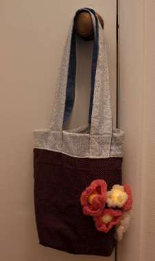 bag with knitted glowing flowers