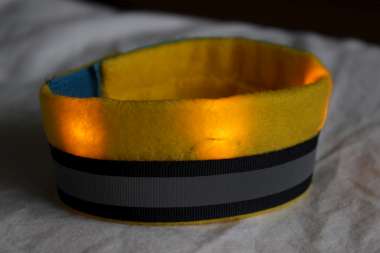 yellow felt band with glowing LEDs