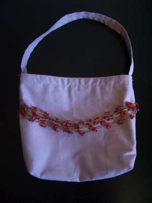 pink bag with sparkly beads